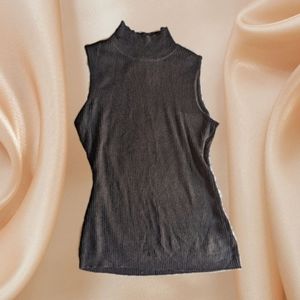 Sleeveless mockneck ribbed top